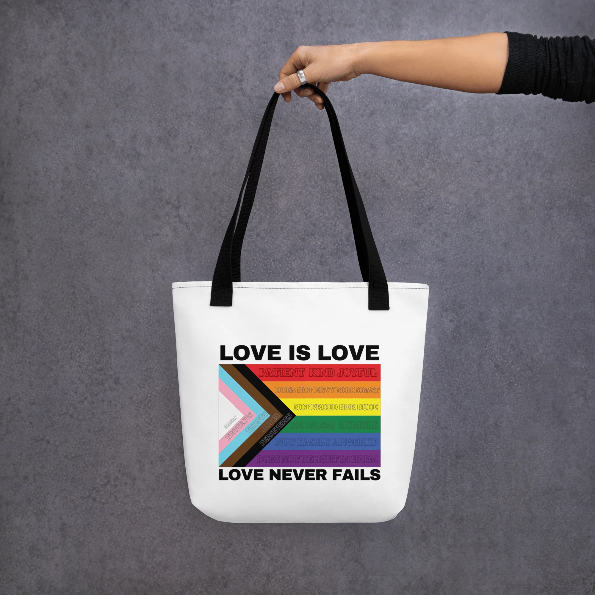 Love Never Fails Tote bag